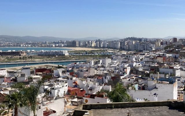Tangier’s white buildings and the curve of the bay seen from above