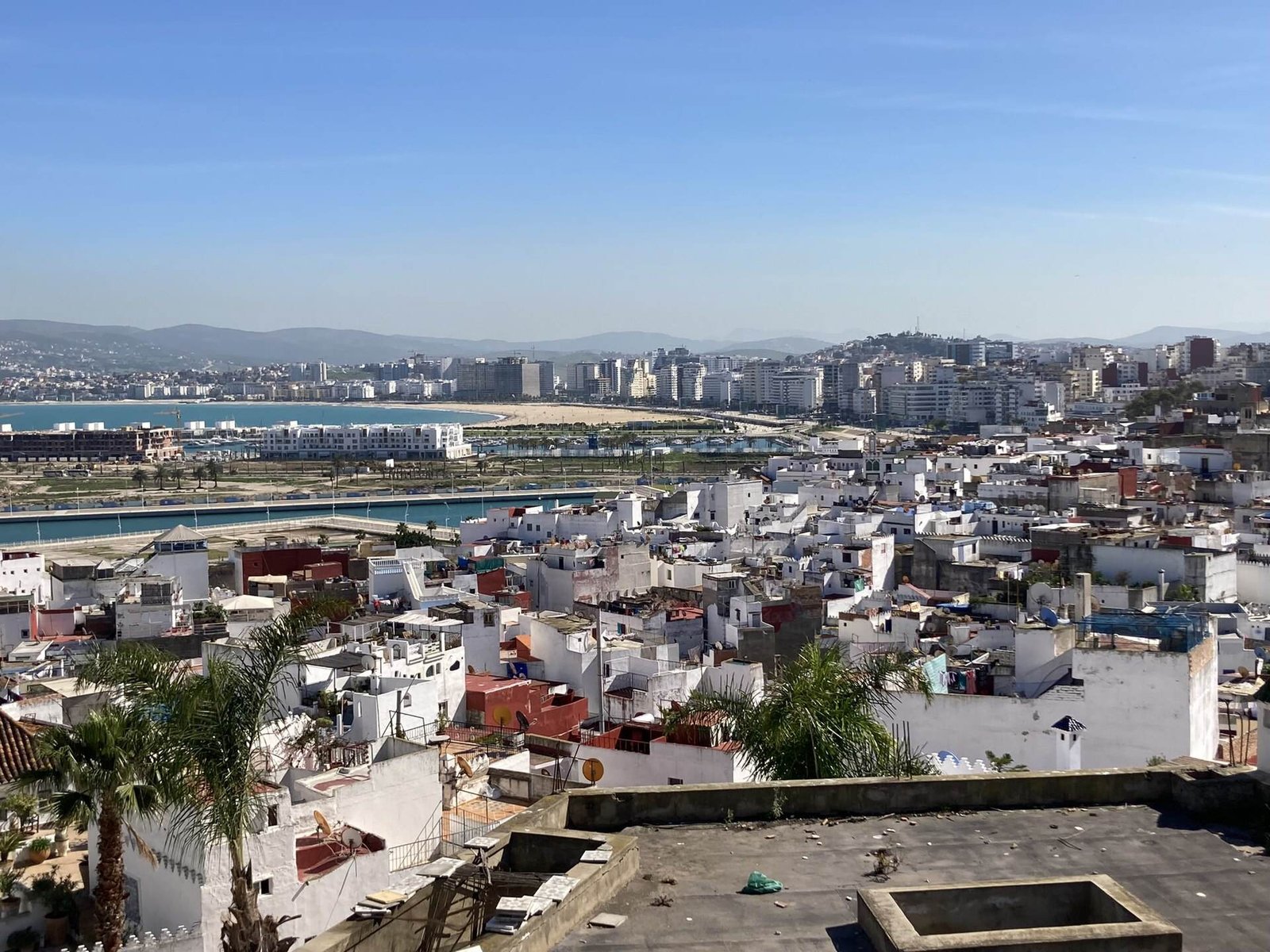 Tangier’s white buildings and the curve of the bay seen from above