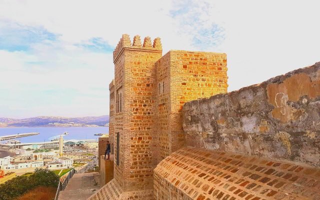 The ochre walls and towers of Tangier’s Kasbah above the city and the sea