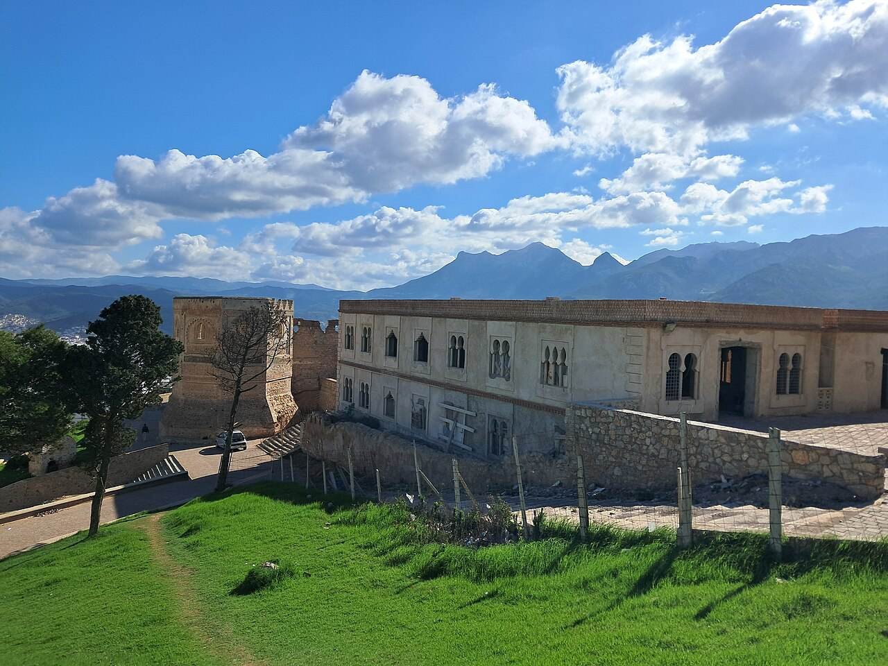 Old walls and buildings near the medina of Tetouan, with mountains behind