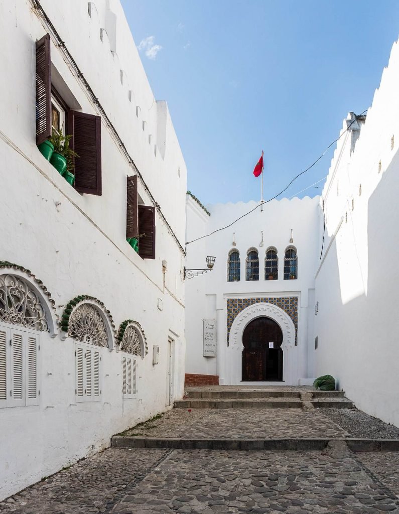 A narrow whitewashed lane in Tangier’s Kasbah leading to an arched doorway