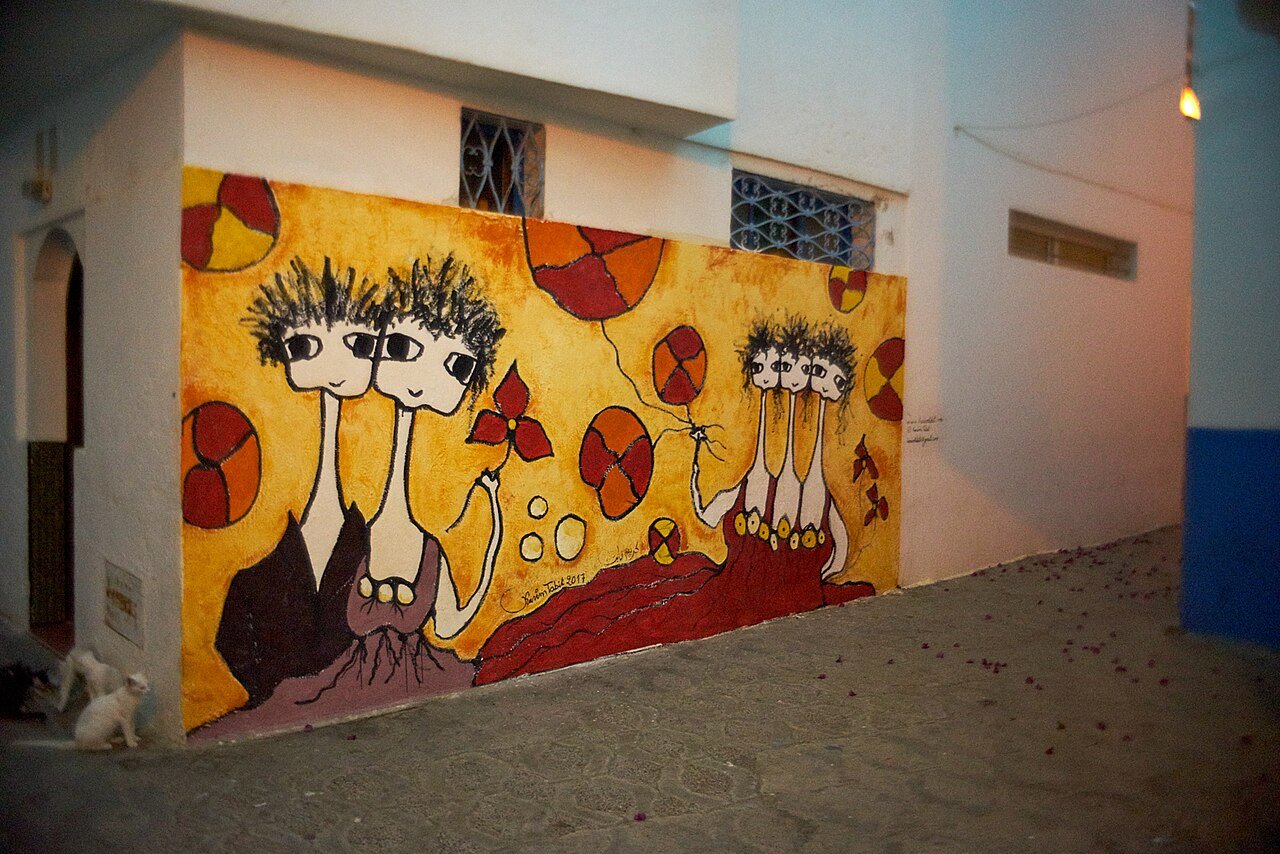 One of the painted walls in the Asilah medina, where artists add new murals every summer.